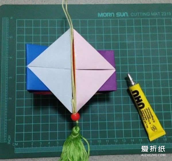 如何折纸灯笼的方法 儿童纸灯笼的折法图解- www.aizhezhi.com
