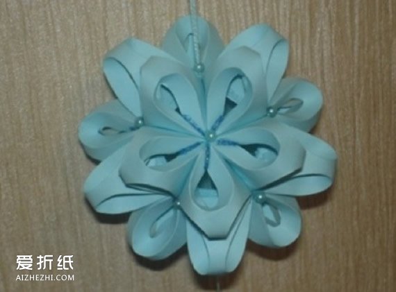 卡纸花球的折纸图解 用卡纸制作花球的教程- www.aizhezhi.com