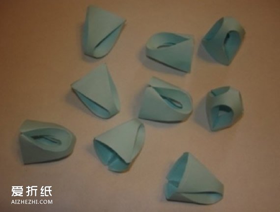 卡纸花球的折纸图解 用卡纸制作花球的教程- www.aizhezhi.com