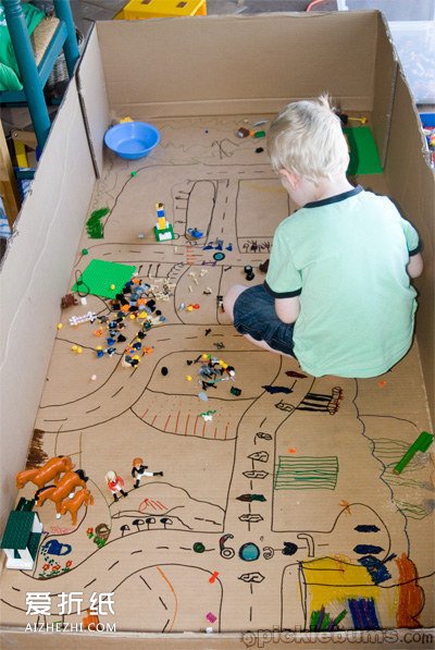 怎么用废纸箱做玩具 纸箱手工制作孩子的玩具- www.aizhezhi.com