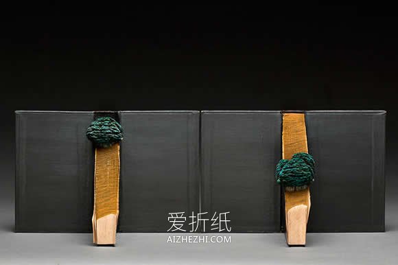 手工旧书雕塑作品图片 壮丽书籍山川纸雕欣赏- www.aizhezhi.com