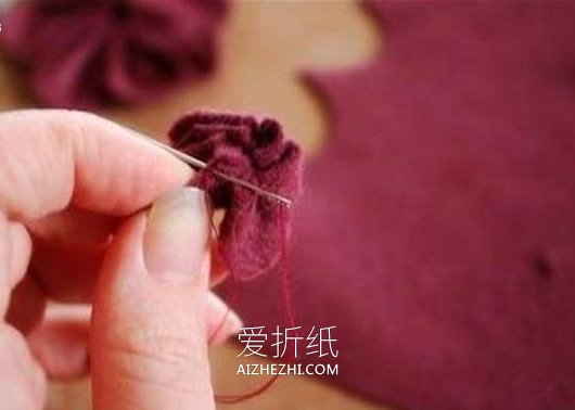 怎么做不织布樱花图解 手工布艺樱花制作方法- www.aizhezhi.com