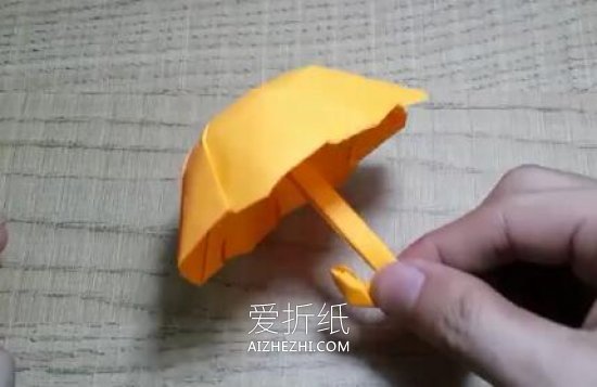 怎么简单折纸雨伞图解 可爱小伞的折法教程- www.aizhezhi.com