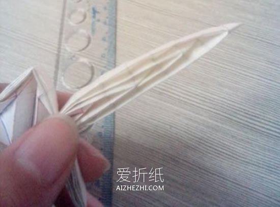 怎么折带翅膀天使图解 手工折纸立体天使步骤- www.aizhezhi.com