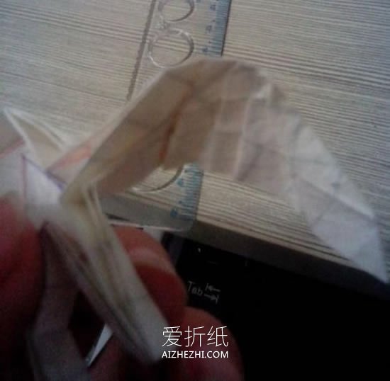 怎么折带翅膀天使图解 手工折纸立体天使步骤- www.aizhezhi.com