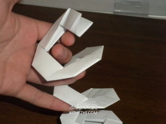怎么折纸弹簧的方法 手工弹簧玩具的折法图解- www.aizhezhi.com