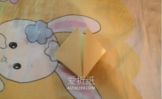 怎么折纸四瓣花图解 手工四瓣纸花的折法过程- www.aizhezhi.com