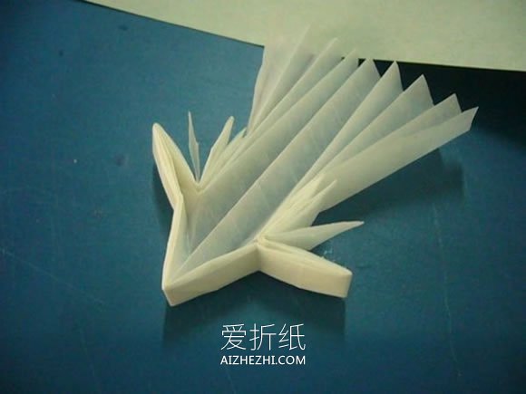 怎么折纸龙头戒指的方法 手工龙之指环的折法- www.aizhezhi.com