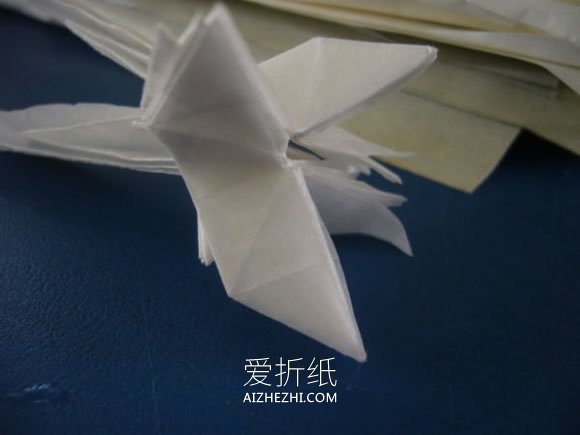 怎么折纸龙头戒指的方法 手工龙之指环的折法- www.aizhezhi.com