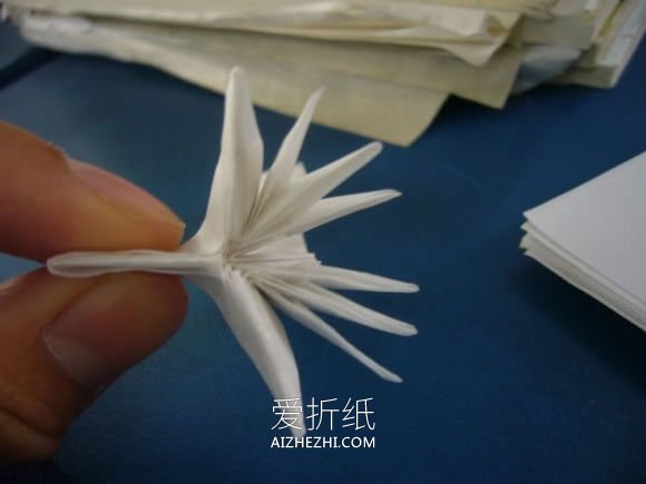 怎么折纸龙头戒指的方法 手工龙之指环的折法- www.aizhezhi.com