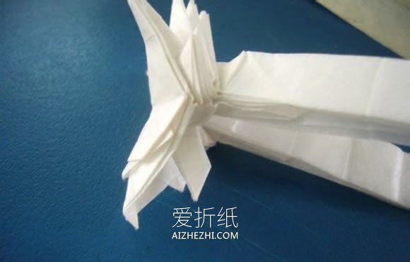 怎么折纸龙头戒指的方法 手工龙之指环的折法- www.aizhezhi.com