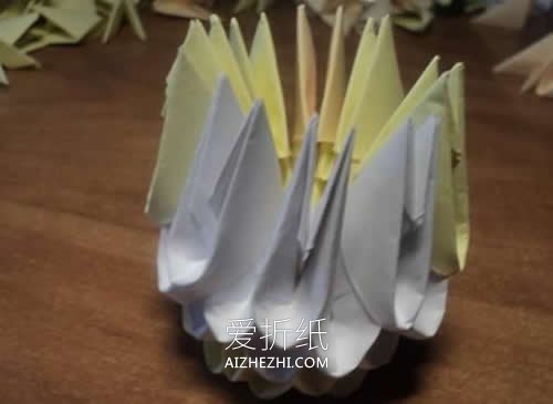 怎么折纸三角插鸭子图解 三角插手工制作鸭子- www.aizhezhi.com