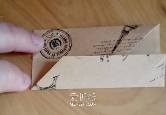 怎么折纸漂亮纸花球 详细手工花球折法步骤- www.aizhezhi.com