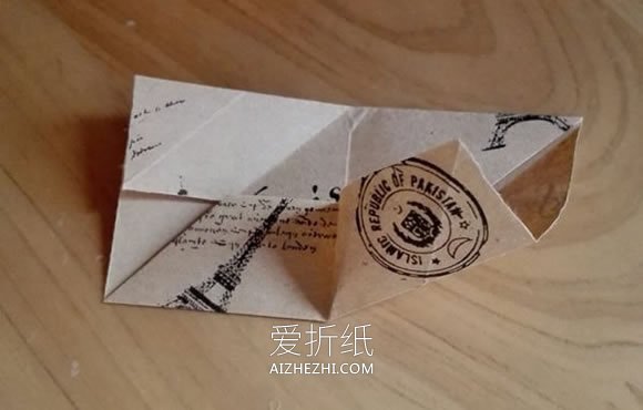 怎么折纸漂亮纸花球 详细手工花球折法步骤- www.aizhezhi.com