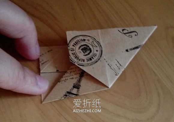 怎么折纸漂亮纸花球 详细手工花球折法步骤- www.aizhezhi.com