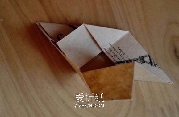 怎么折纸漂亮纸花球 详细手工花球折法步骤- www.aizhezhi.com