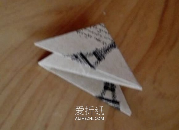 怎么折纸漂亮纸花球 详细手工花球折法步骤- www.aizhezhi.com