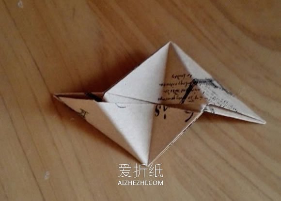 怎么折纸漂亮纸花球 详细手工花球折法步骤- www.aizhezhi.com