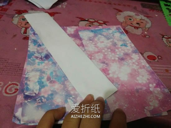 怎么简单折纸立体荷花 彩纸手工制作荷花做法- www.aizhezhi.com