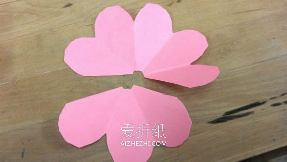 怎么用彩纸做玫瑰花图解 简单纸玫瑰手工制作- www.aizhezhi.com