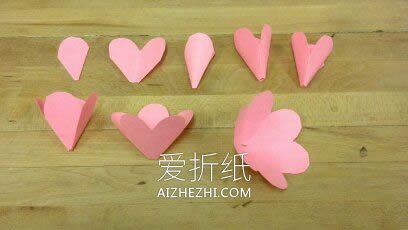 怎么用彩纸做玫瑰花图解 简单纸玫瑰手工制作- www.aizhezhi.com