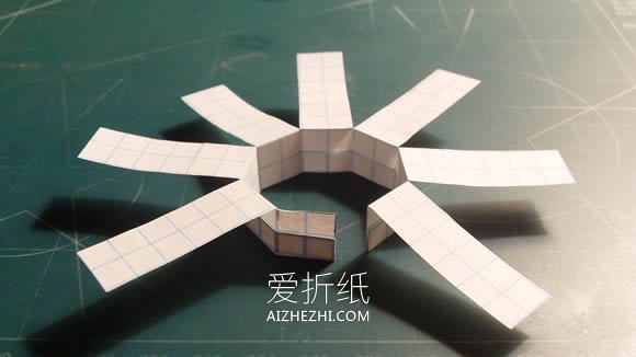怎么做旋风纸飞机图解 手工制作七翼飞机教程- www.aizhezhi.com