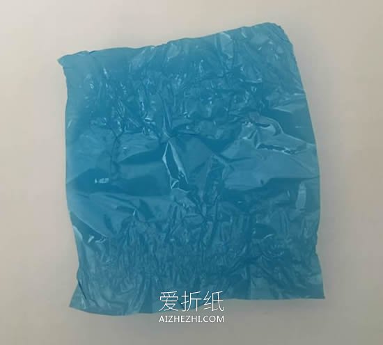 怎么简单做玻璃纸花 玻璃纸手工制作花朵图解- www.aizhezhi.com