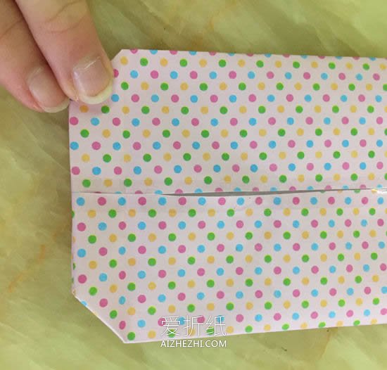 怎么简单折纸礼品包装纸袋的折法图解教程- www.aizhezhi.com