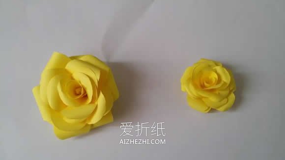 怎么用彩纸做山茶花的手工教程图解- www.aizhezhi.com