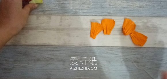 怎么做皱纹纸罂粟花的手工图解教程- www.aizhezhi.com