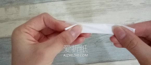 怎么做皱纹纸罂粟花的手工图解教程- www.aizhezhi.com