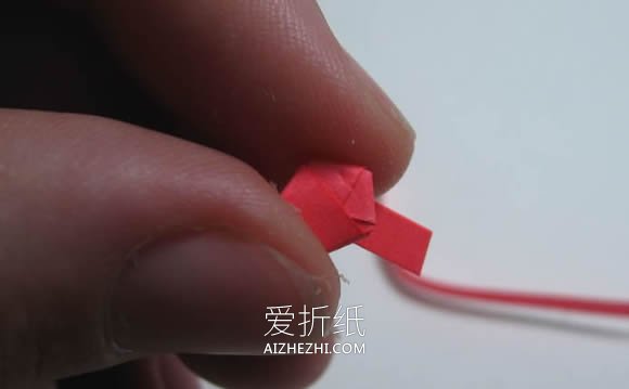 怎么手工折纸制作幸运星戒指的方法图解- www.aizhezhi.com