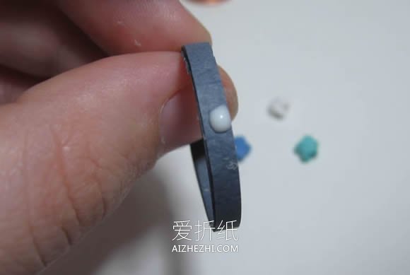 怎么手工折纸制作幸运星戒指的方法图解- www.aizhezhi.com