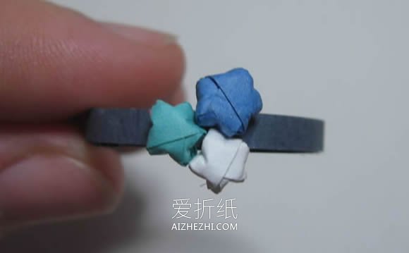 怎么手工折纸制作幸运星戒指的方法图解- www.aizhezhi.com