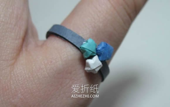 怎么手工折纸制作幸运星戒指的方法图解- www.aizhezhi.com