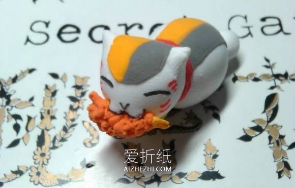 怎么用超轻粘土制作叼着鱼的招财猫图解- www.aizhezhi.com