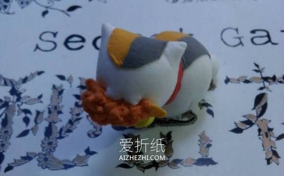 怎么用超轻粘土制作叼着鱼的招财猫图解- www.aizhezhi.com