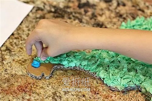 幼儿怎么做纸板恐龙的手工制作教程- www.aizhezhi.com