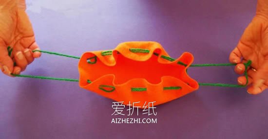 怎么做万圣节南瓜糖果袋的布艺手工教程- www.aizhezhi.com
