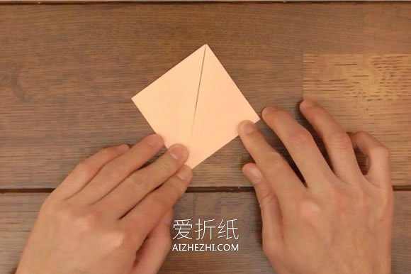 怎么折纸像史努比可爱狗狗的折法图解- www.aizhezhi.com