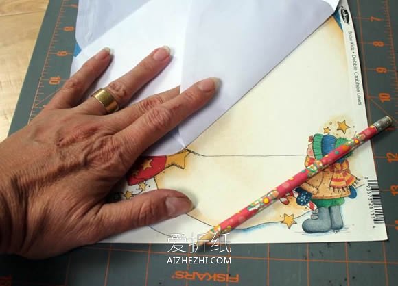 怎么用旧杂志日历做信封的折纸方法图解- www.aizhezhi.com