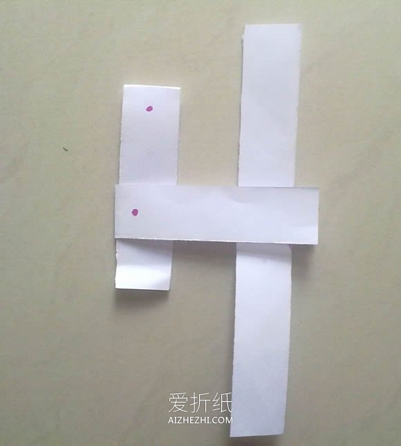 怎么用三张纸条折纸三叶小风车的折法图解- www.aizhezhi.com