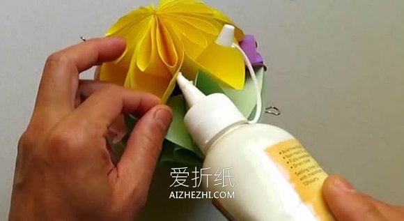 简单又漂亮纸花球怎么折的图解教程- www.aizhezhi.com