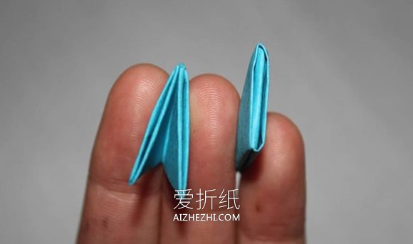 怎么做三角插孔雀的详细步骤图解教程- www.aizhezhi.com