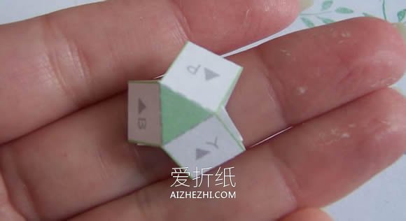 怎么做纸玫瑰花胸花的制作方法图解教程- www.aizhezhi.com