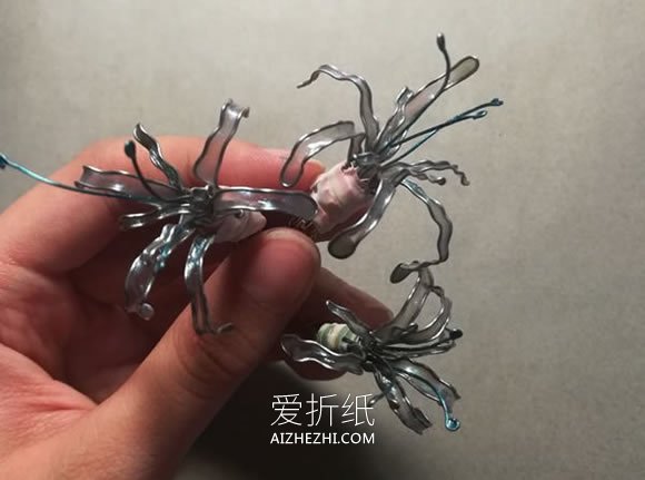 怎么做美丽指甲油花的制作方法图解- www.aizhezhi.com