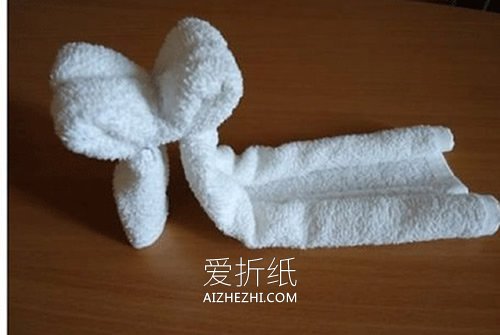 怎么用毛巾做狗狗布偶的折叠方法图解- www.aizhezhi.com