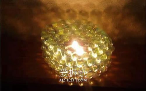 怎么用旧光盘和玻璃弹珠做烛台的方法- www.aizhezhi.com