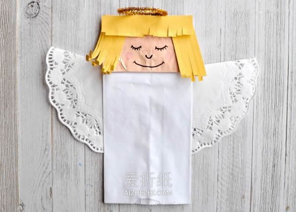 用纸袋子做圣诞天使的方法- www.aizhezhi.com
