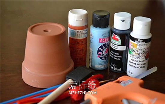 用花盆和扭扭棒制作雪人的方法- www.aizhezhi.com